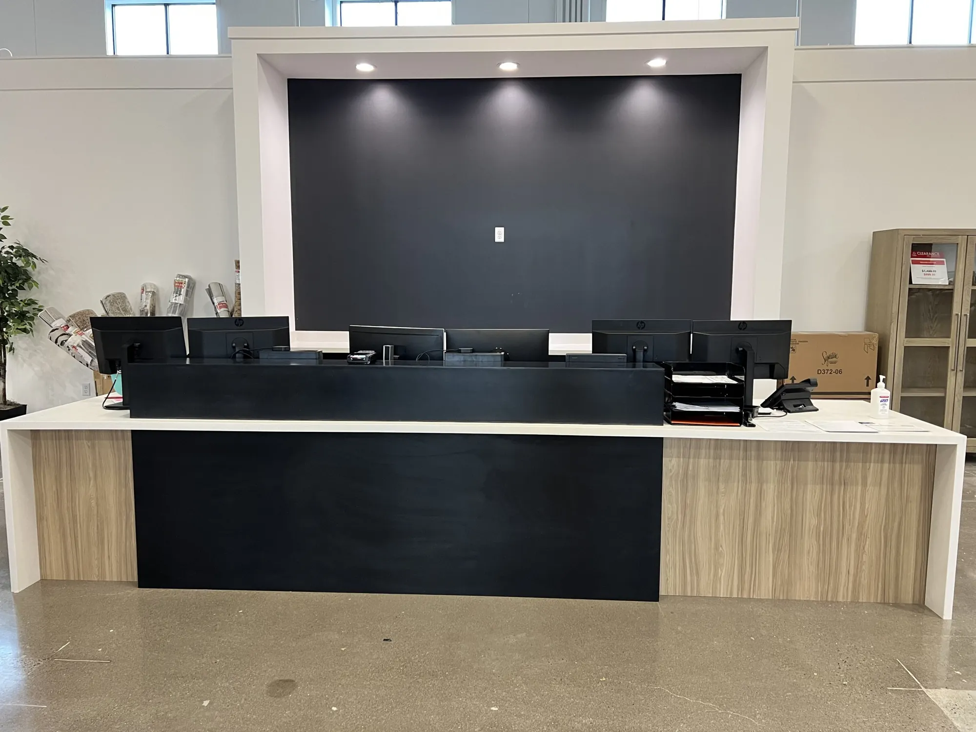 Reception desk with a white waterfall top