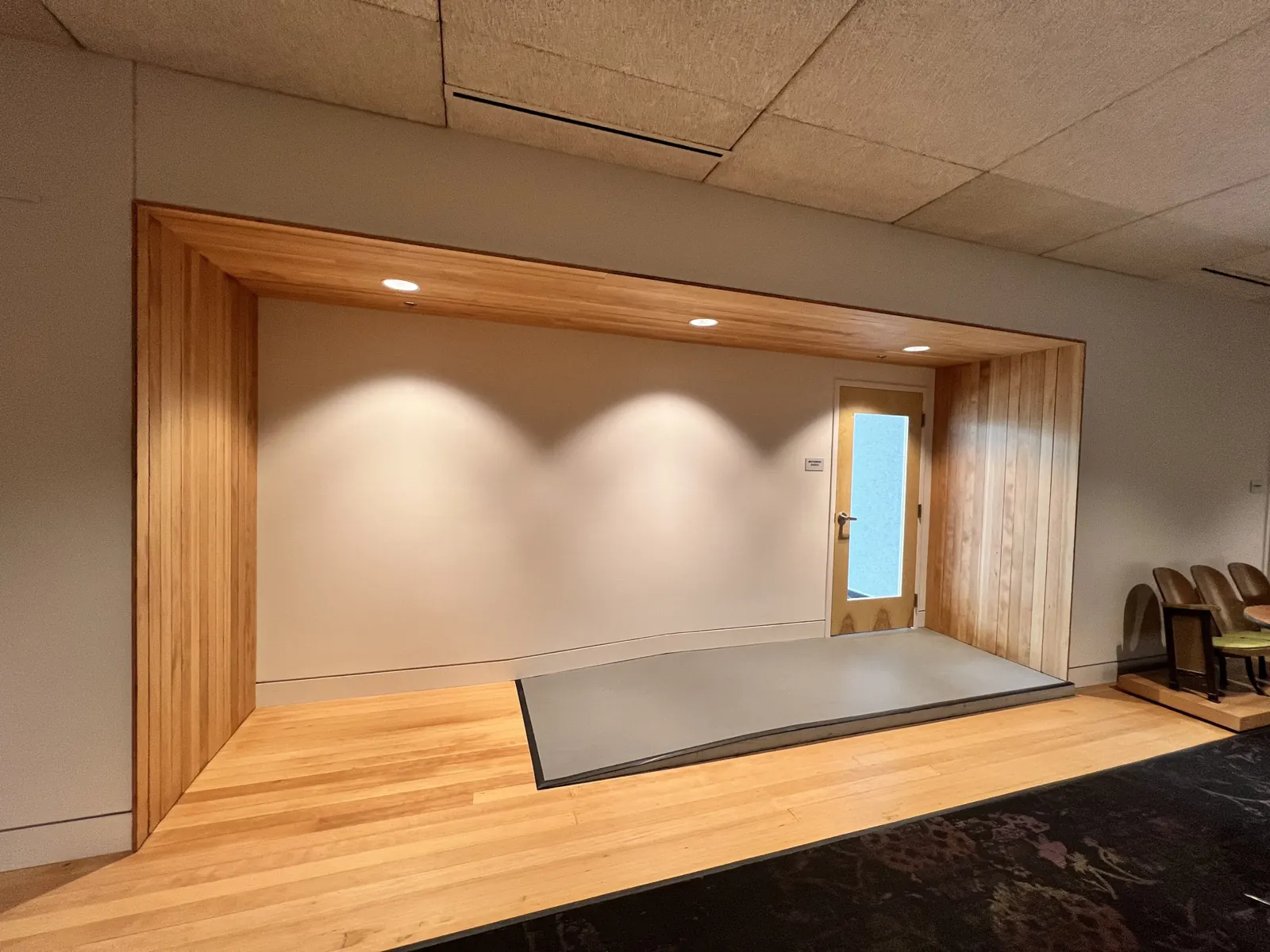 Stage alcove wrapped in wood
