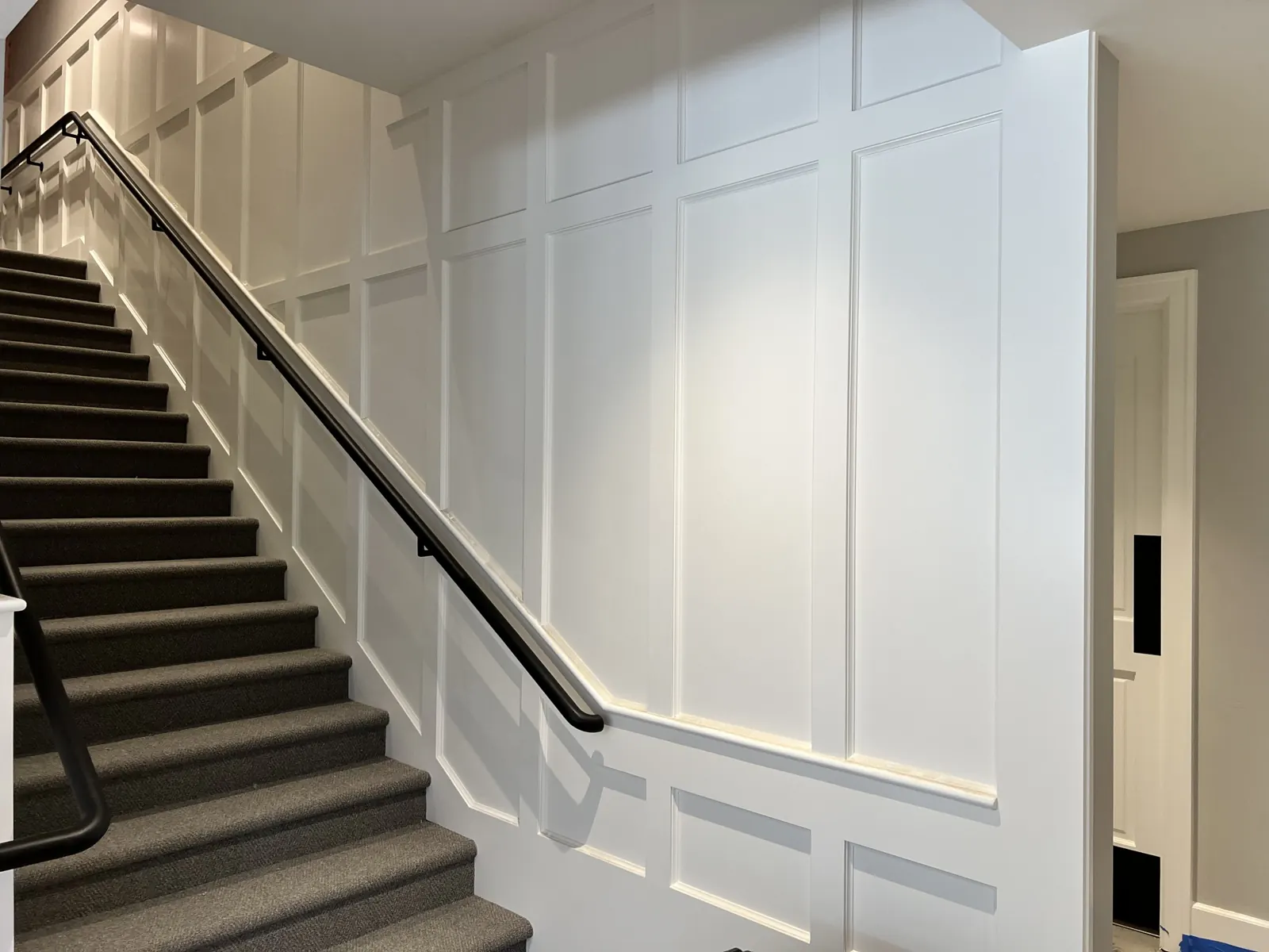 Panel wainscot running up a stairway