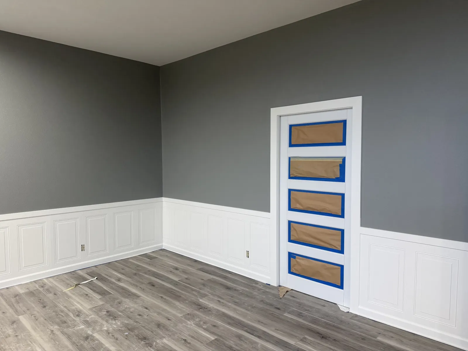 Painted wainscot and door casing